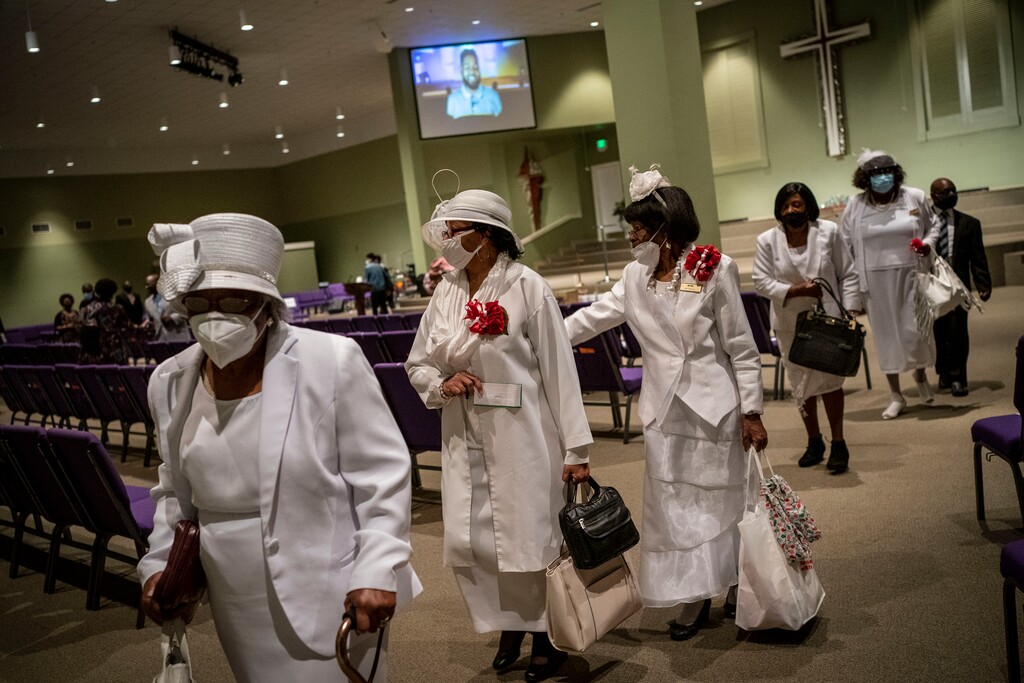 (Wong Maye-E | AP photo)

Women wearing face masks leave after a church service at the New Horizon International Church, Sunday, Oct. 4, 2020, in Jackson, Miss. Across the country, racial minorities, especially Black people, have been hit hard by COVID-19.