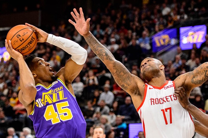 (Trent Nelson | The Salt Lake Tribune)  
Utah Jazz guard Donovan Mitchell (45) defended by Houston Rockets forward PJ Tucker (17). The Utah Jazz host the Houston Rockets, NBA basketball in Salt Lake City on Thursday Dec. 6, 2018.