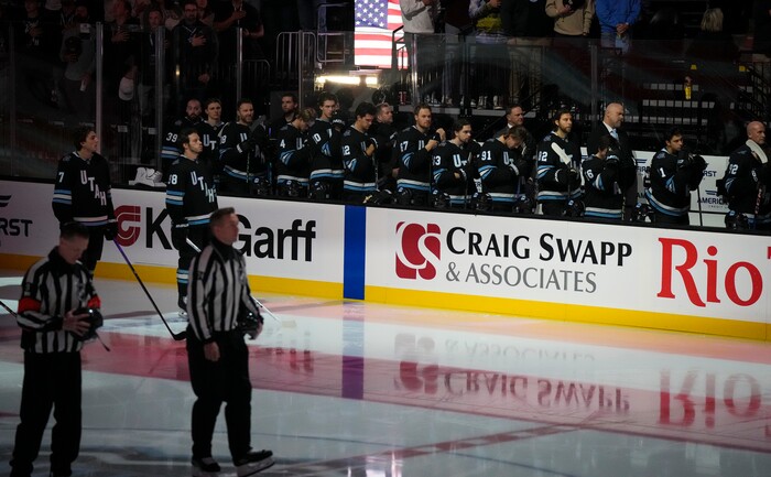 (Bethany Baker | The Salt Lake Tribune) Utah Hockey Club stands during the National Anthem before the game between the Utah Hockey Club and the Colorado Avalanche at the Delta Center in Salt Lake City on Thursday, Oct. 24, 2024.