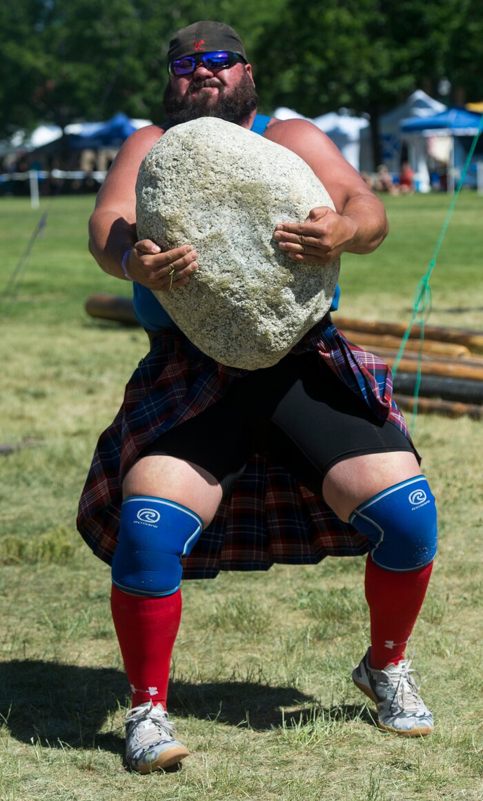 (Rick Egan  |  The Salt Lake Tribune)      Brian Huddleston, from Oklahoma City,  competes in the stone lifting competition at the 44th annual Utah Scottish Festival and Highland Games at the Utah State Fairgrounds, Sunday, June 10, 2018.