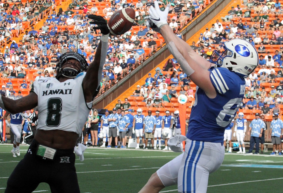 December 24, 2019 - Hawaii Rainbow Warriors defensive back Eugene Ford (8) breaks up a pass intended for Brigham Young Cougars tight end Alema Pilimai (88) during a game at the SoFi Hawaii Bowl between the Brigham Young Cougars and the Hawaii Rainbow Warriors at the Stan Sheriff Center in Honolulu, HI - Michael Sullivan/CSM.(Credit Image: &copy; Michael Sullivan/CSM via ZUMA Wire) (Cal Sport Media via AP Images)