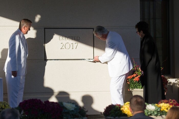 (Courtesy The Church of Jesus Christ of Latter-day Saints) Dieter F. Uchtdorf puts mortar around the cornerstone of The LDS Church's temple in Meridian, Idaho, on Sunday.