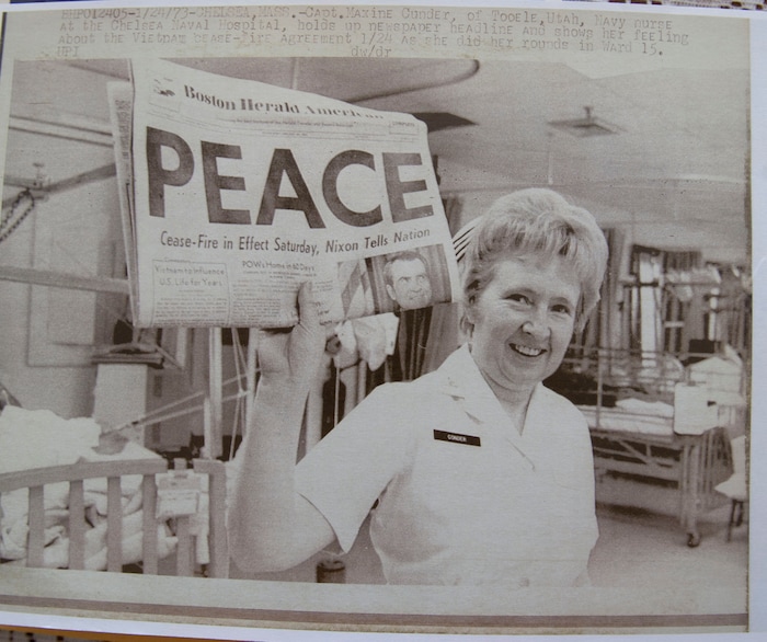 (Steve Griffin  |  Tribune File Photo)  In this UPI photograph Maxine Conder holds a newspaper announcing that peace had been achieved in Viet Nam in 1973. Conder was a naval nurse at the Chelswa Naval Hospital at the time. Conder was the second female Admiral in U.S. Naval history. She served as a nurse in Korea and in administrative roles during Vietnam. Conder and several other veterans will be honored on Veteran's Day at the University of Utah.