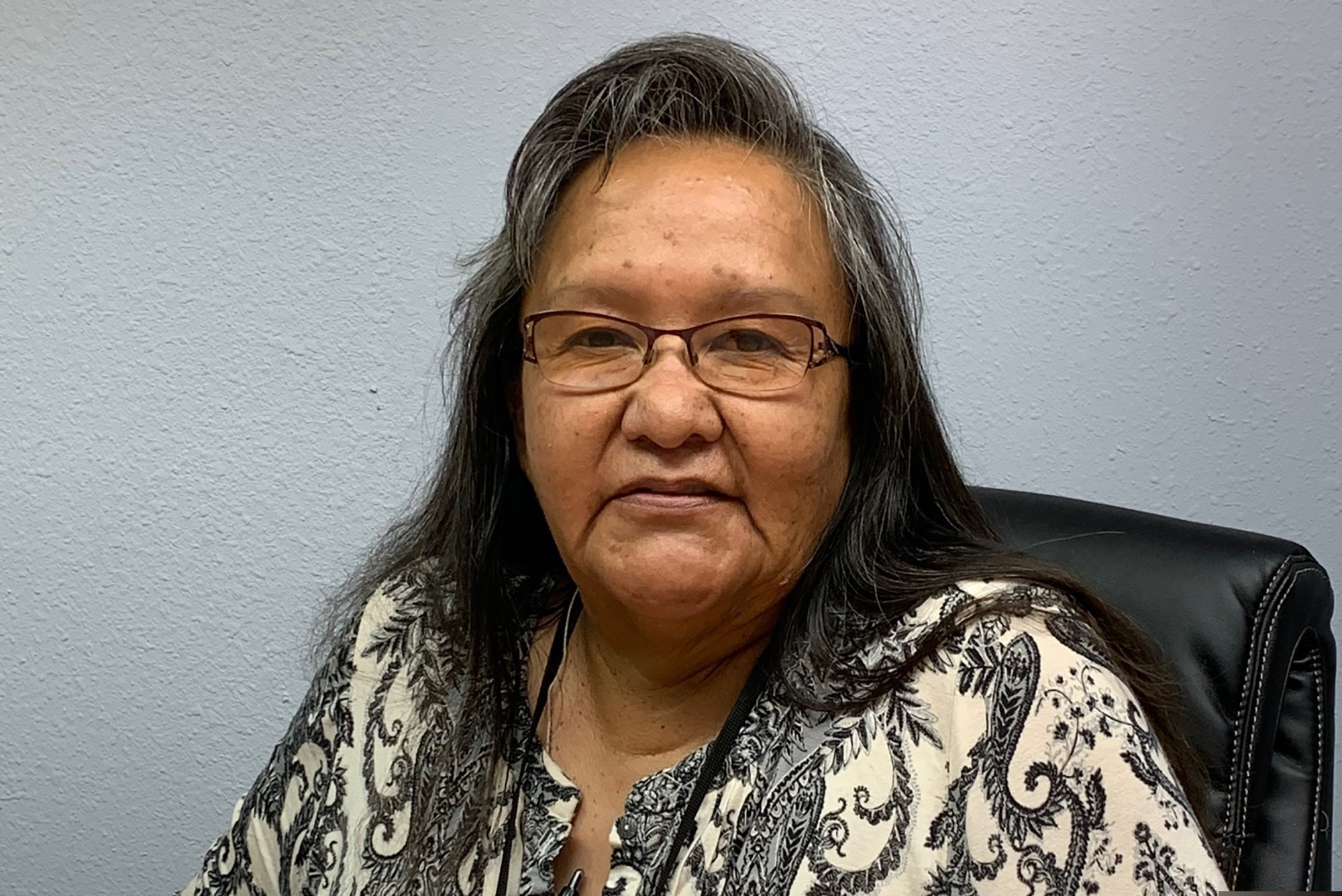 (David Jordan via AP) Eloise Brown poses Friday, Aug. 14, 2020, in a law office in Gallup, N.M. Brown is suing the Navajo Nation over the cancellation of the tribe's primary election.