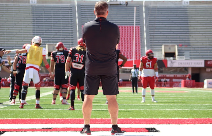 (Christopher Kamrani | The Salt Lake Tribune) Utah head coach Kyle Whittingham looks on from the north end zone of Utah's Red-White game Saturday afternoon at Rice-Eccles Stadium.