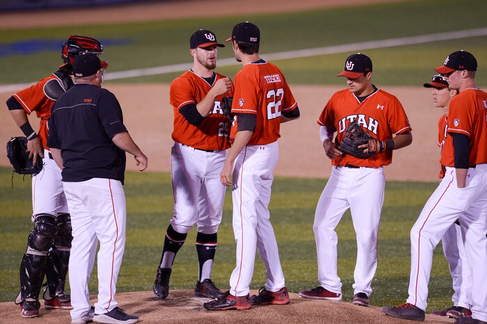 (Leah Hogsten  |  The Salt Lake Tribune) Utah's pitcher Spencer Johnson hands off to pitcher Josh Tedeschi in the 7th inning as Brigham Young University hosts University of Utah at Miller Park, Tuesday, April 24, 2018 in Provo.