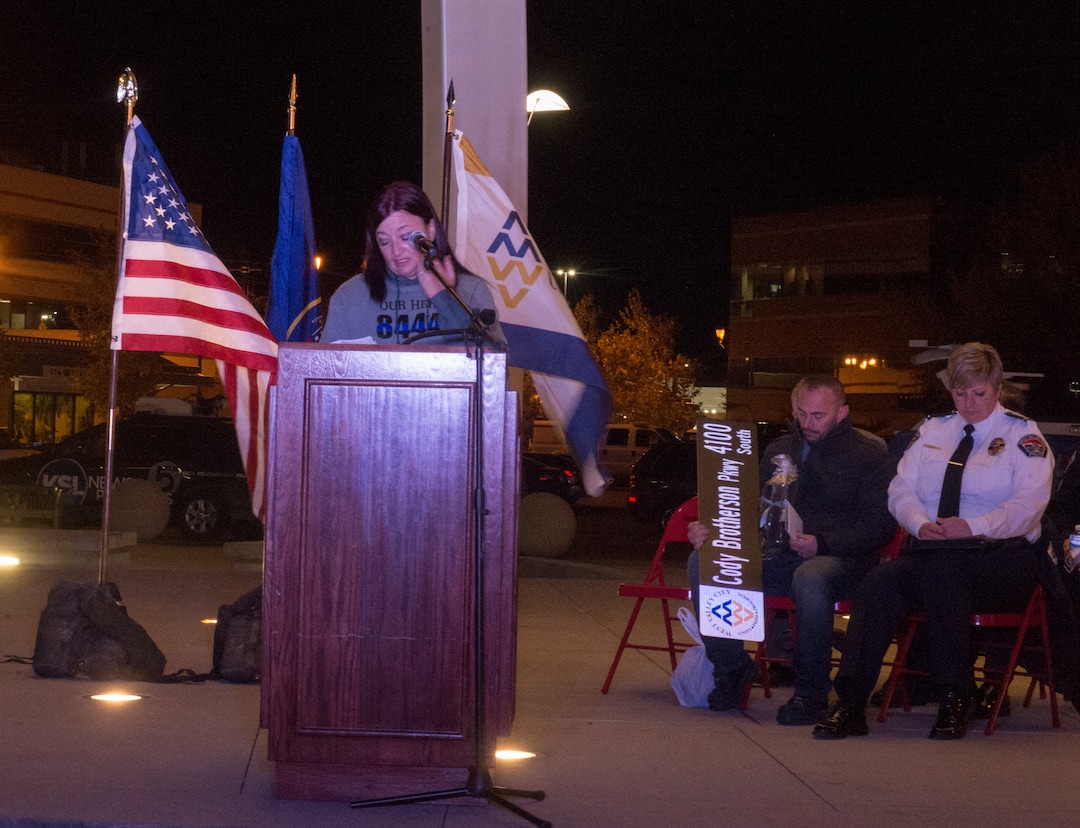 (Rick Egan  |  The Salt Lake Tribune)  Jenny Brotherson, mother of Cody Brotherson, speaks during a memorial ceremony at Fairbourne Station Plaza in West Valley City, in remembrance of her son Cody, who was killed in the line of duty one year ago today. It was announced tonight that West Valley will name 4100 South Cody Brotherson Parkway. Monday, November 6, 2017.