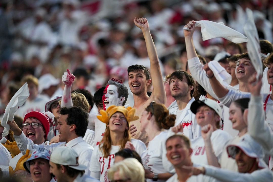 (Bethany Baker  |  The Salt Lake Tribune) Utah Utes fans cheer during the game between the Utah Utes and the Kansas Jayhawks at Rice-Eccles Stadium in Salt Lake City on Saturday, Oct. 10, 2026.