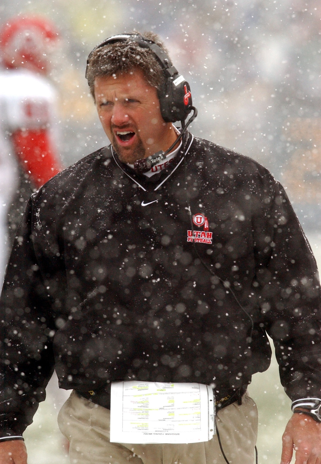 (Rick Egan  |  Tribune file photo)  Defensive coordinator Kyle Whittingham coaches the Utes defense on a snowy day in Provo against BYU on Saturday November 22, 2003 at LaVell Edwards Stadium.