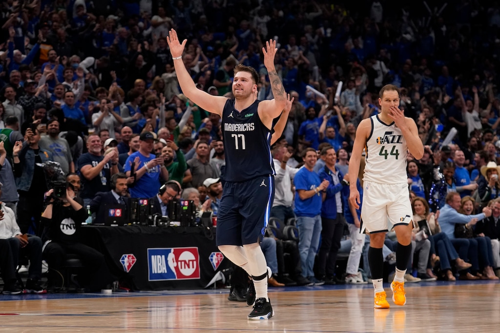 Dallas Mavericks guard Luka Doncic (77) celebrates after scoring against the Utah Jazz during the second half of Game 5 of an NBA basketball first-round playoff series, Monday, April 25, 2022, in Dallas. (AP Photo/Tony Gutierrez)
