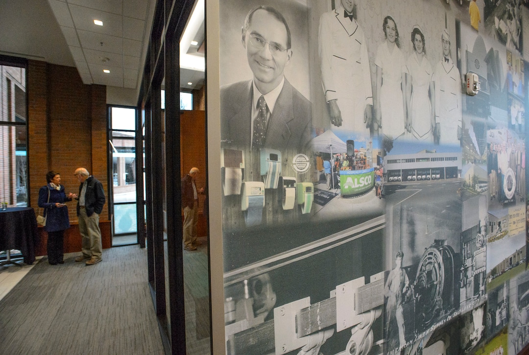 (Steve Griffin  |  The Salt Lake Tribune) The new offices of Salt Lake City-based Alsco, which has 17,000 employees worldwide involved in supplying clean linens and uniforms daily to 300,000 customers in 13 countries, features one wall covered with a collage of photographs in the company's lengthy history, which in Utah dates to 1895 — the year before statehood.