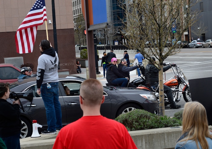 (Scott Sommerdorf | The Salt Lake Tribune)
Motorcyclists tried to disrupt this protest by revving their engines as a group of about 40 people protested the strikes on Syria, Sunday, April 15, 2018.