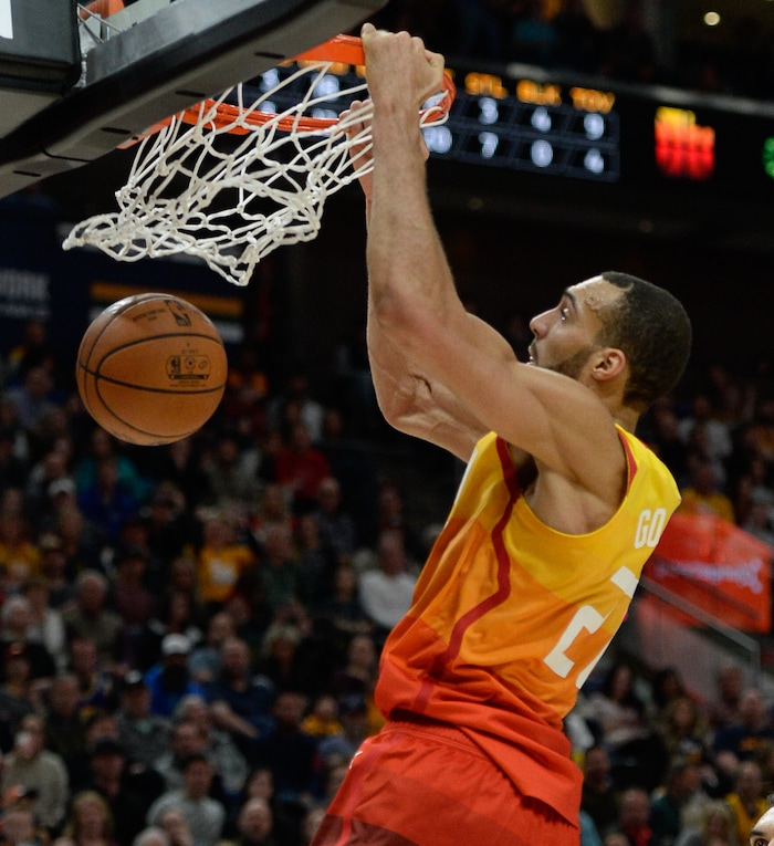 (Francisco Kjolseth  |  The Salt Lake Tribune)   Utah Jazz center Rudy Gobert (27) slams one in past the Thunder in the NBA game at Vivint Smart Home Arena Sat., Dec. 22, 2018, in Salt Lake City.