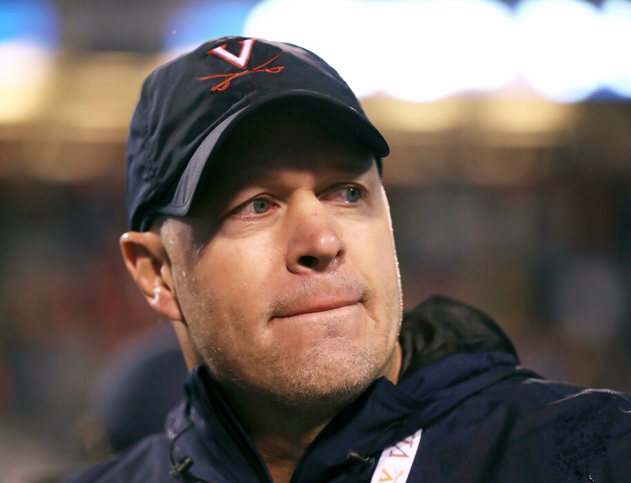 (Zack Wajsgras | AP file photo) Virginia head coach Bronco Mendenhall after a win over Georgia Tech in an NCAA college football game in Charlottesville, Va., on Nov. 4, 2017.