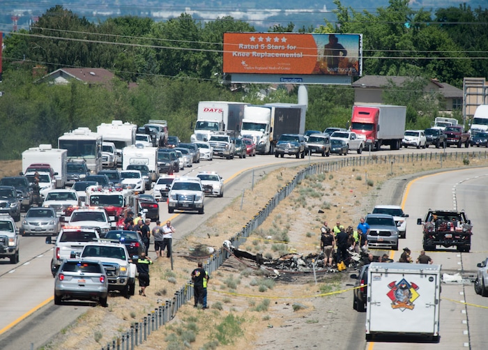 Rick Egan  |  The Salt Lake Tribune

Four people died then their small plane crashed in the middle of I-15 near Riverdale around 1:00pm. The crash closed the freeway to northbound traffic, Wednesday, July 26, 2017.


