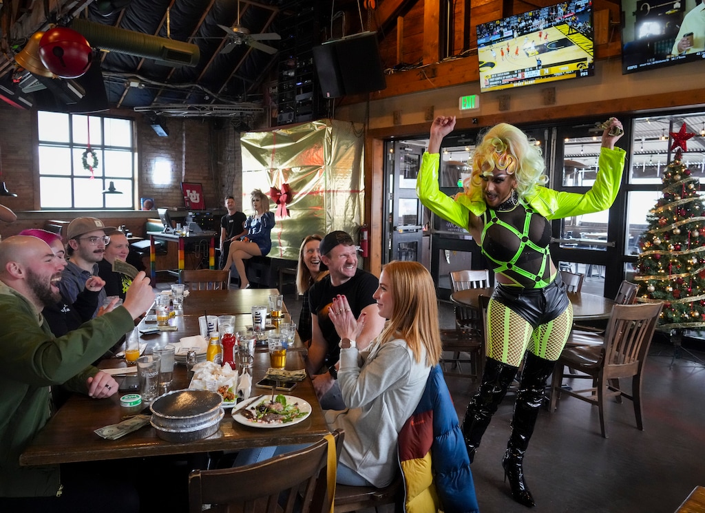 (Bethany Baker  |  The Salt Lake Tribune) Drag performer Kay Bye dances during the weekly Tailgate Drag Brunch at The Locker Room, a gay sports bar, in Salt Lake City on Saturday, Dec. 2, 2023.