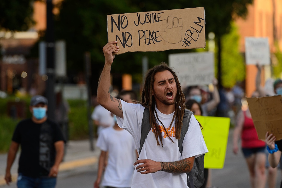 (Trent Nelson  |  The Salt Lake Tribune) Protesters march against police brutality in Salt Lake City on Tuesday, June 2, 2020.