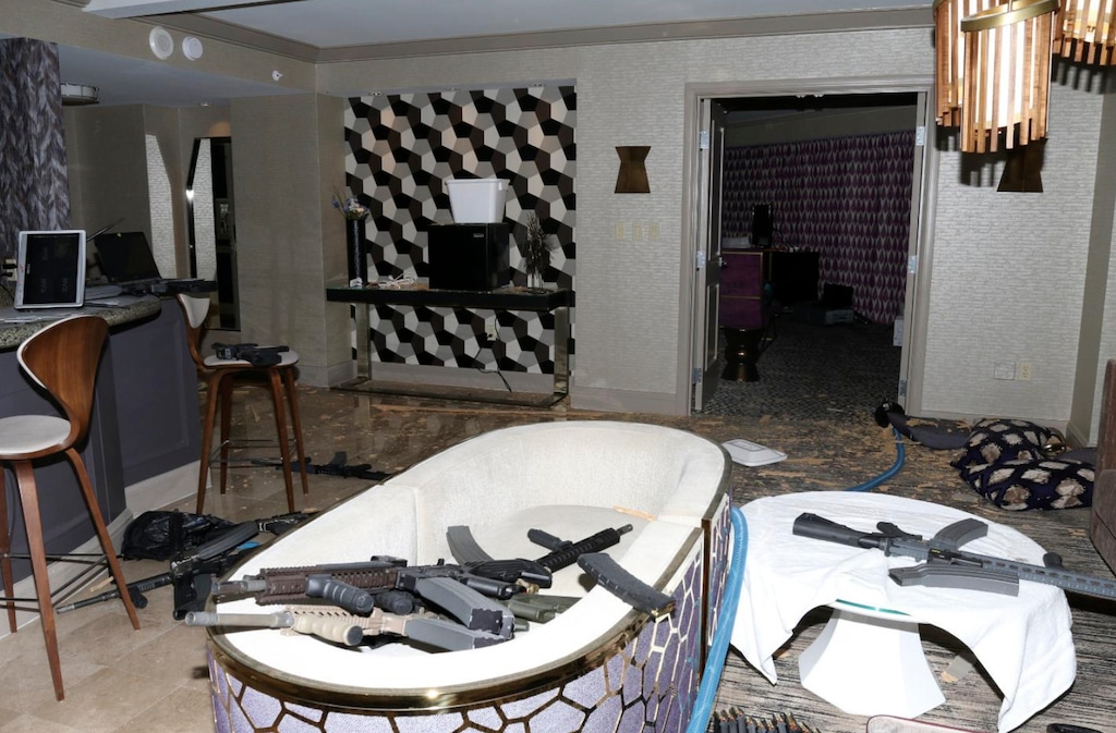 FILE - This Oct. 2017 file photo released by the Las Vegas Metropolitan Police Department Force Investigation Team Report shows the interior of Las Vegas shooter Stephen Paddock's 32nd floor room of the Mandalay Bay hotel. An autopsy found Las Vegas shooter Stephen Paddock had anti-anxiety drugs in his system but was not under the influence of them and was otherwise healthy. The report released Friday, Feb. 9, 2018, showed signs of benzodiazepines in Paddock's system but said because the substances were found in his urine and not his blood, Paddock wasn't under the influence of the medication. It said he was overweight but otherwise healthy. Paddock killed 58 people and injured more than 800 others during the Oct. 1 massacre. (Las Vegas Metropolitan Police Department via AP, File)
