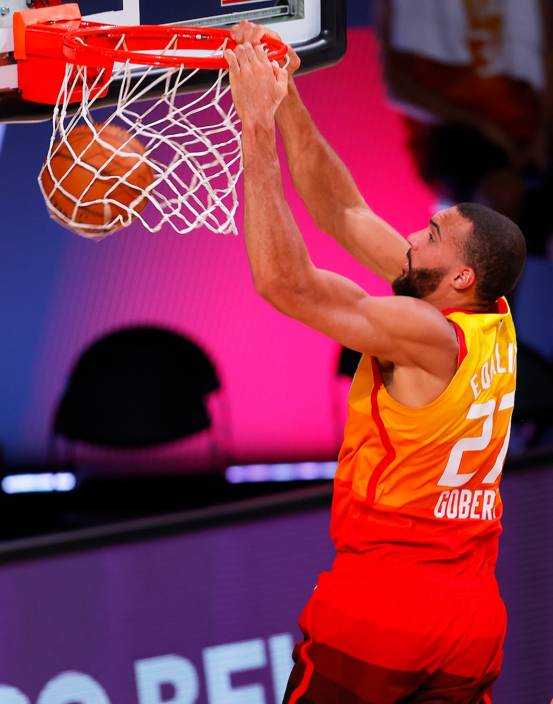 Utah Jazz's Rudy Gobert dunks against the Denver Nuggets during the second quarter of Game 3 of an NBA basketball first-round playoff series, Friday, Aug. 21, 2020, in Lake Buena Vista, Fla. (Mike Ehrmann/Pool Photo via AP)