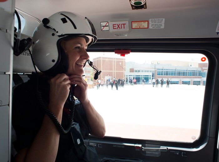 (Rick Egan  |  The Salt Lake Tribune)       Sheila Fuller, flight therapist, prepares fir a fight in one of the AirMed helicopters. The University of Utah serves the single biggest geographic area of any academic medical center in the United States.  
Thursday, May 31, 2018.


