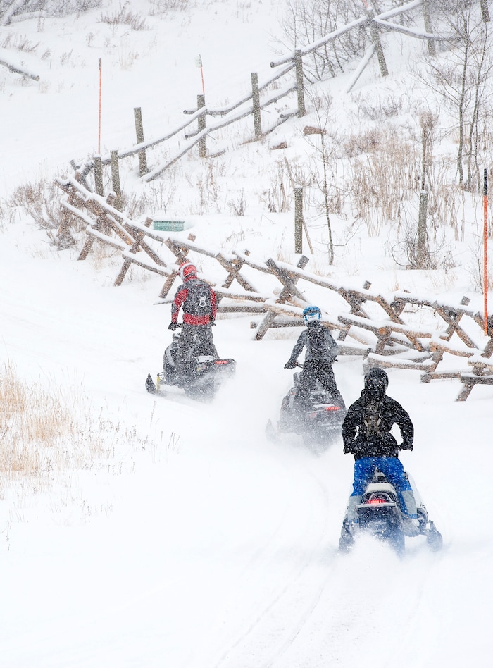 (Scott Sommerdorf   |  The Salt Lake Tribune)   
The Varvell family visiting from Connecticut rented snowmobiles at Daniel Summit Saturday, December 23, 2017. While the number of snowmobile licenses in Utah is declining, trail usage is up dramatically.  
