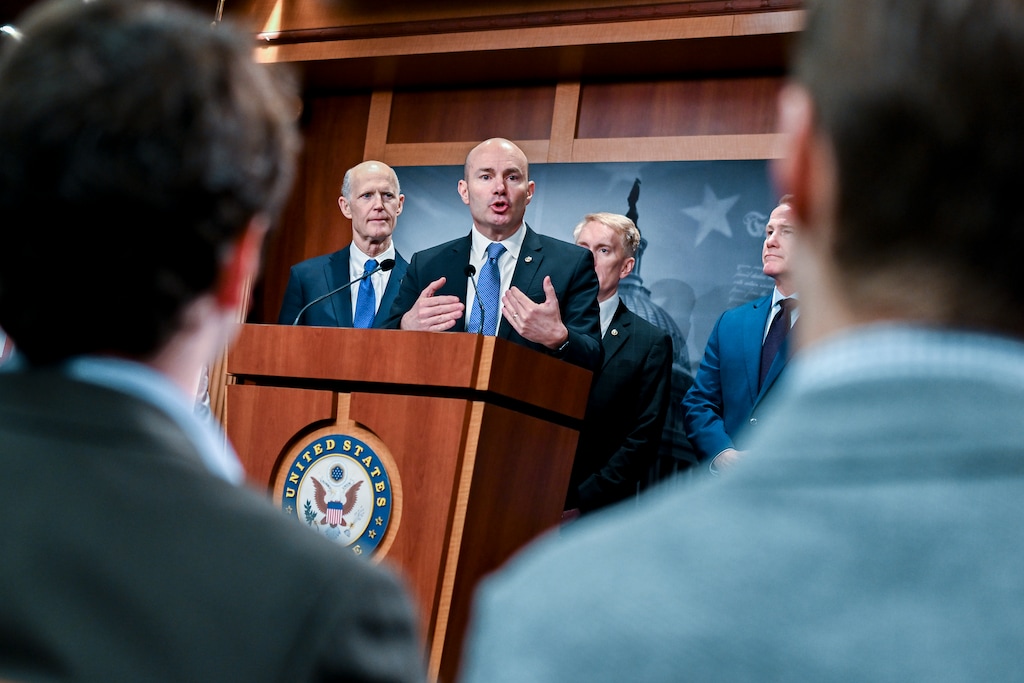(Kenny Holston | The New York Times) Sen. Mike Lee, R-Utah, speaks during a news conference  regarding the SAVE Act, a voter ID bill, at the Capitol in Washington, on Thursday, March 19, 2026.