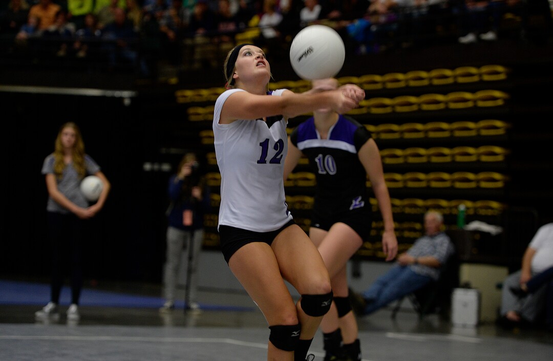 Scott Sommerdorf  |  The Salt Lake TribuneJaquelyn Langhaim saves a ball as Pleasant Grove defeated Lehi 25-21 to take the first set of their 5A volleyball championship match at UCCU, Saturday, November 8, 2014.