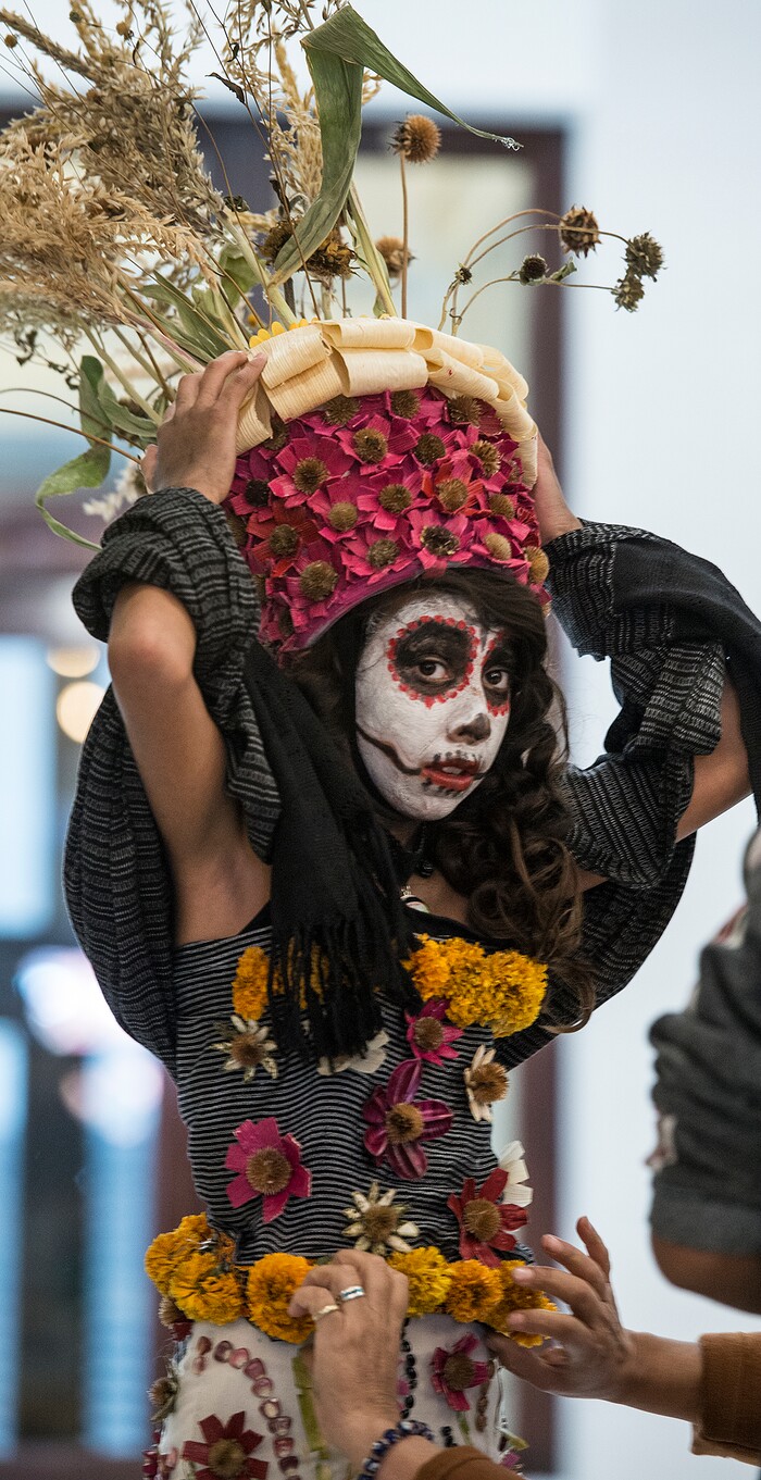 (Leah Hogsten | The Salt Lake Tribune) Day of the Dead costume contestant Mayra Castro said it two nearly two days for her and her mother Maria Gervacio to make her dress at the festival Saturday, October 21, 2017 at the Capitol.