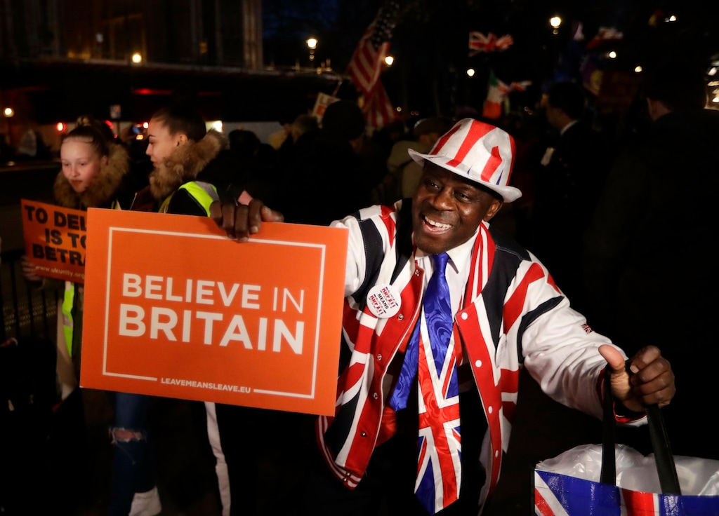 (AP Photo/Matt Dunham)Pro-Brexit leave the European Union supporters react outside the Houses of Parliament in London, Thursday, March 14, 2019. British lawmakers have voted to delay Brexit, just 15 days before the country is scheduled to leave the European Union. The House of Commons voted by 412-202 in favor of seeking to postpone the U.K.'s departure for at least three months beyond the scheduled March 29 departure from the EU.