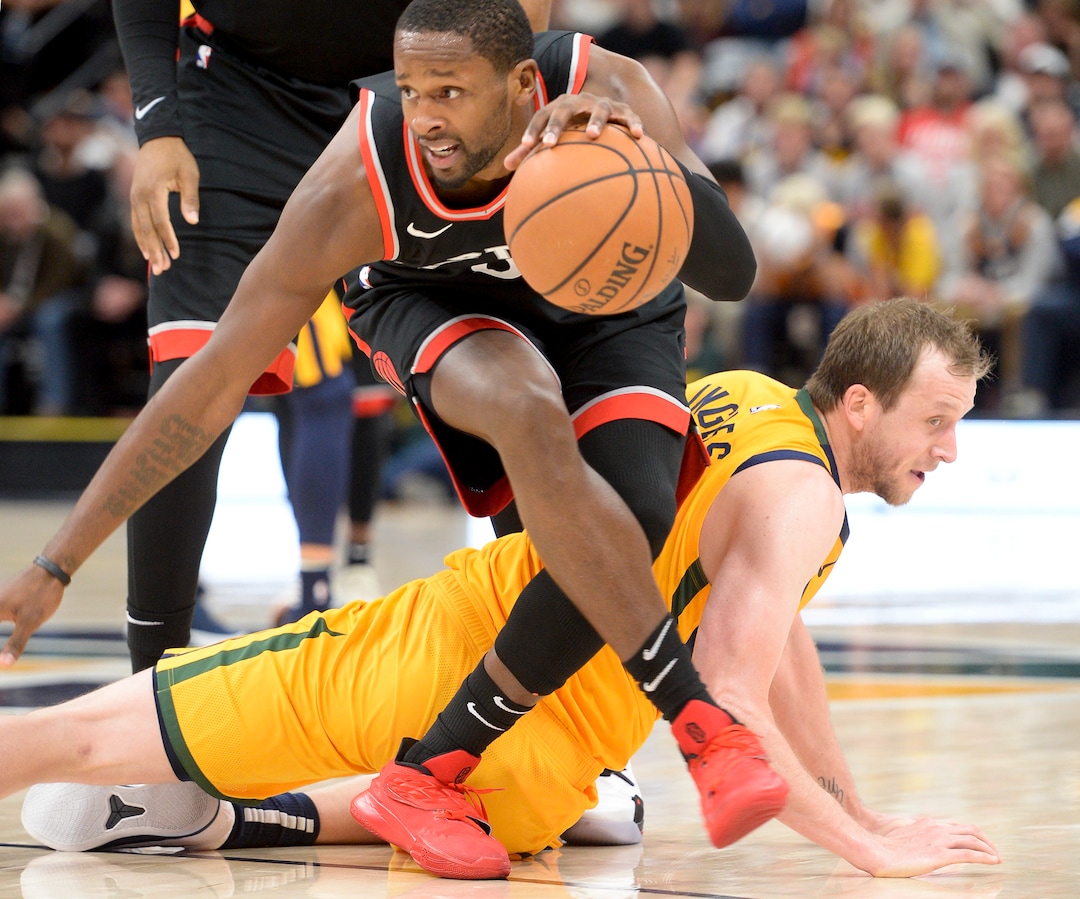Leah Hogsten  |  The Salt Lake Tribune  Utah Jazz forward Joe Ingles (2) hits the deck trying to stay with Toronto Raptors forward CJ Miles (0) in the second half as the Utah Jazz lose to the Toronto Raptors, 111-124, Monday, Nov. 5, 2018 at Vivint Smart Home Arena.