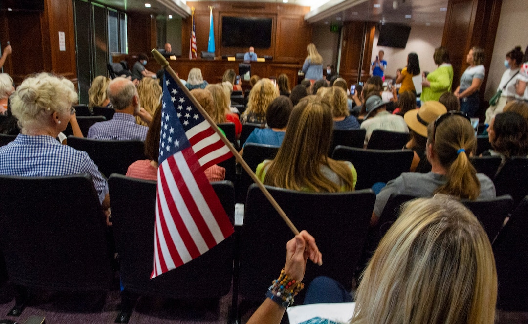 (Rick Egan  |  The Salt Lake Tribune)    Anti=-mask protesters speak do the remaining commissioners, Bill Lee and Nathan Ivie, after commissioner Tanner Ainge left the room, after the meeting was adjourned by a 2-1 vote because the room was too crowded and he felt that the crowd was breaking the health code, before the Utah County Commission meeting got started,  in Provo, on Wednesday, July 15, 2020.