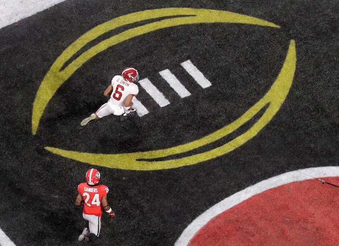 Alabama's DeVonta Smith catches a touchdown pass during overtime of the NCAA college football playoff championship game against Georgia Monday, Jan. 8, 2018, in Atlanta. Alabama won 26-23. (AP Photo/John Bazemore)