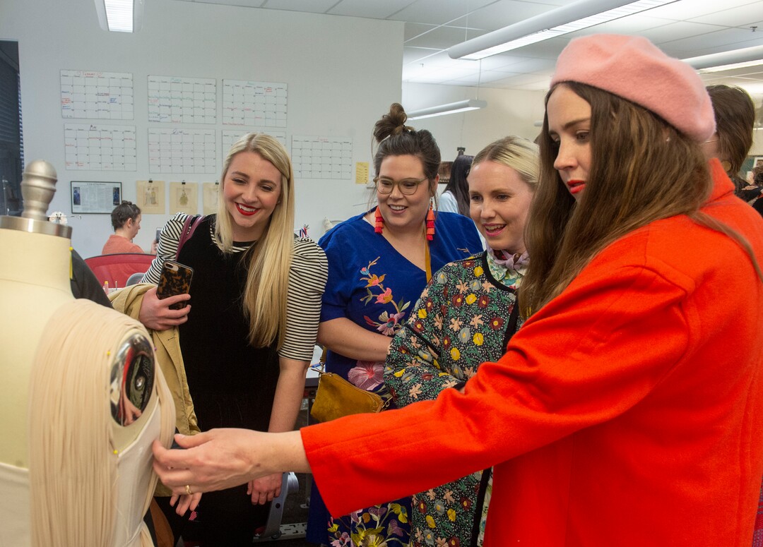 (Rick Egan  |  The Salt Lake Tribune)  Social media influencers inspect a costume during a preview event for "Norma," at the Utah Opera Production Studios, Monday, April 15, 2019.