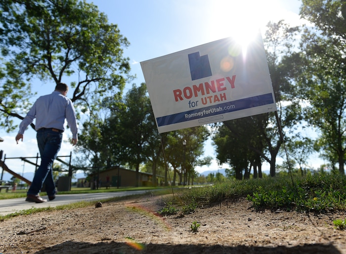 (Francisco Kjolseth | The Salt Lake Tribune) The Romney campaign hosts "Mondays With Mitt" at Veterans Memorial Park in West Jordan on Monday, June 18, 2018 as senate candidate Mitt Romney visits with supporters and takes a few questions with the dozens gathered at the park.