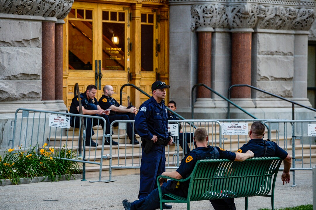 (Leah Hogsten  |  The Salt Lake Tribune) Over 30 Salt Lake City Police officers, many riding bikes, were in attendance at Lights for Liberty: A Vigil to End Human Detention Camps at Washington Square, July 12, 2019 to protest the inhumane conditions faced by refugees.