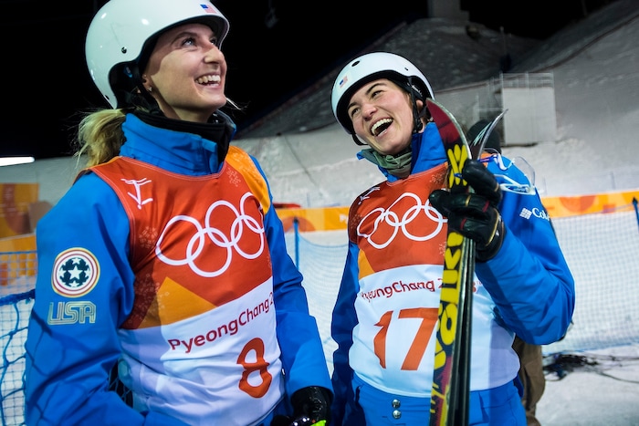 (Chris Detrick  |  The Salt Lake Tribune)  USA's Kiley McKinnon, left, and USA's Madison Olsen react after learning they both qualified for the finals during the Ladies' Aerials Qualification at Phoenix Park during the Pyeongchang 2018 Winter Olympics Thursday, Feb. 15, 2018.  