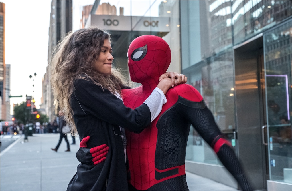 (JoJo Whilden  |  Columbia Pictures / Sony Pictures / Marvel) Spider-Man (Tom Holland, right) gives M.J. (Zendaya) a lift in the action thriller "Spider-Man: Far From Home."