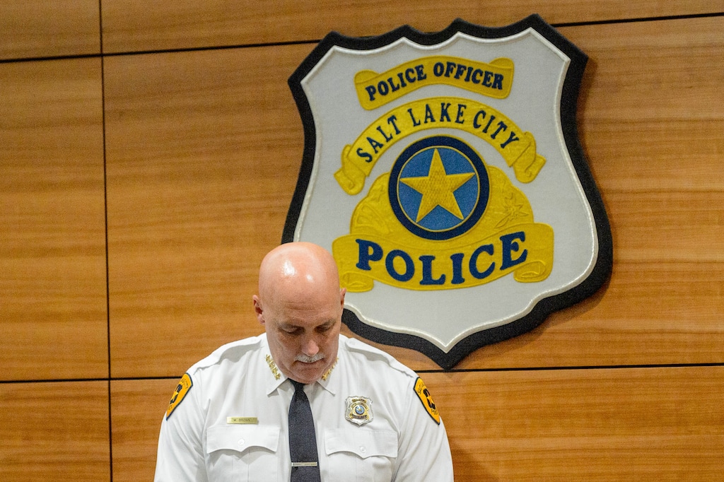 (Trent Nelson  |  The Salt Lake Tribune) Salt Lake City police chief Mike Brown listens as mayor Erin Mendenhall speaks at a news conference on the release of video showing another police shooting in Salt Lake City,  on Monday, Sept. 21, 2020.