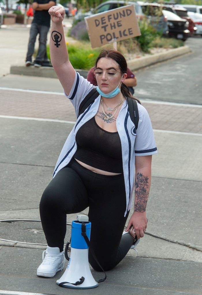 (Rick Egan  |  The Salt Lake Tribune)     Sofia Alcala leads the marchers in a moment of silence for Bernardo, during a  march during a Justice for Bernardo rally in the streets of Salt Lake City on Thursday, June 25, 2020.