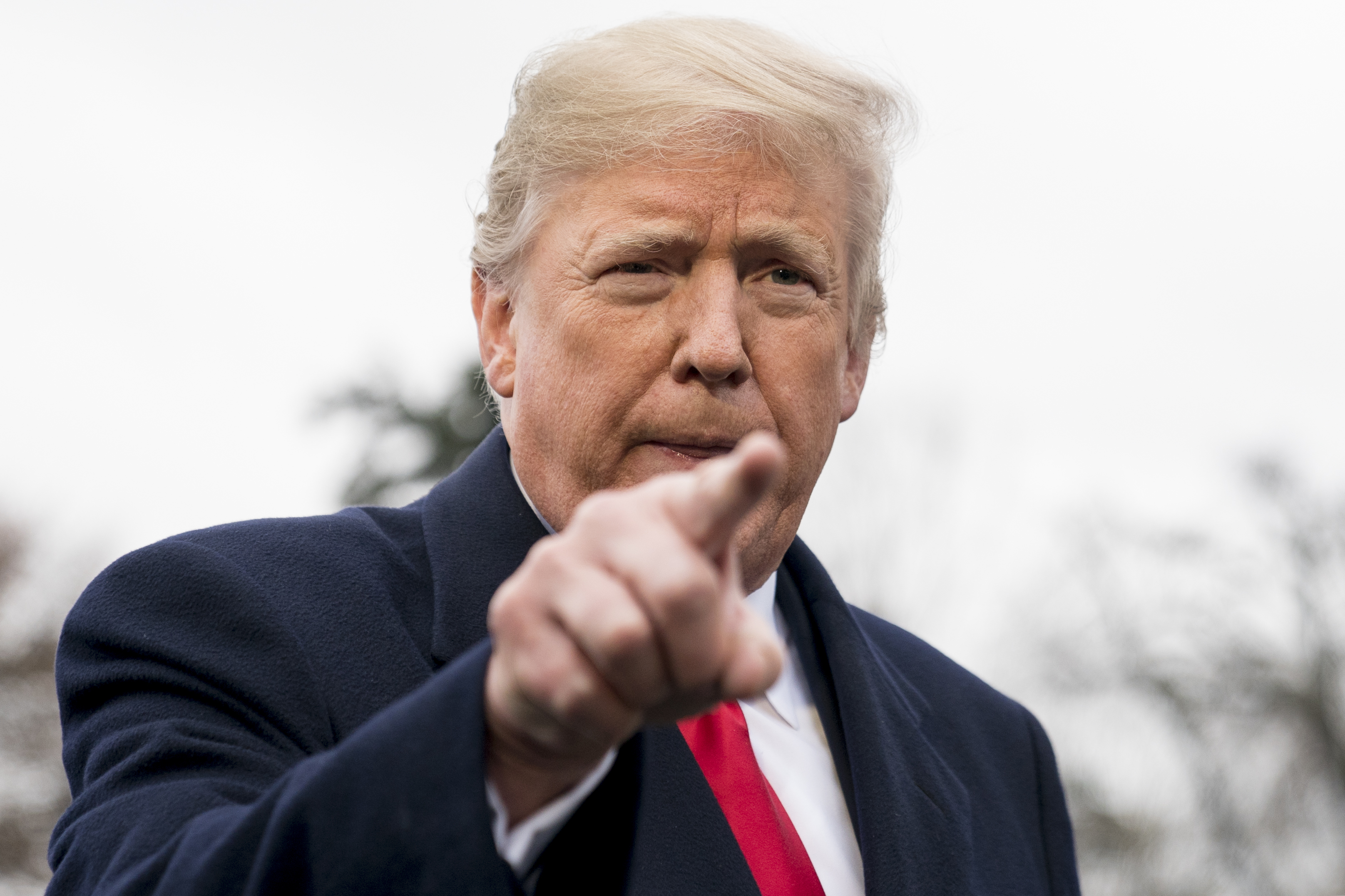 (Andrew Harnik | The Associated Press) President Donald Trump calls on a reporter as he speaks to members of the media before boarding Marine One on the South Lawn of the White House in Washington, Monday, Nov. 26, 2018, for a short trip to Andrews Air Force Base, Md., and then on to Mississippi for rallies.