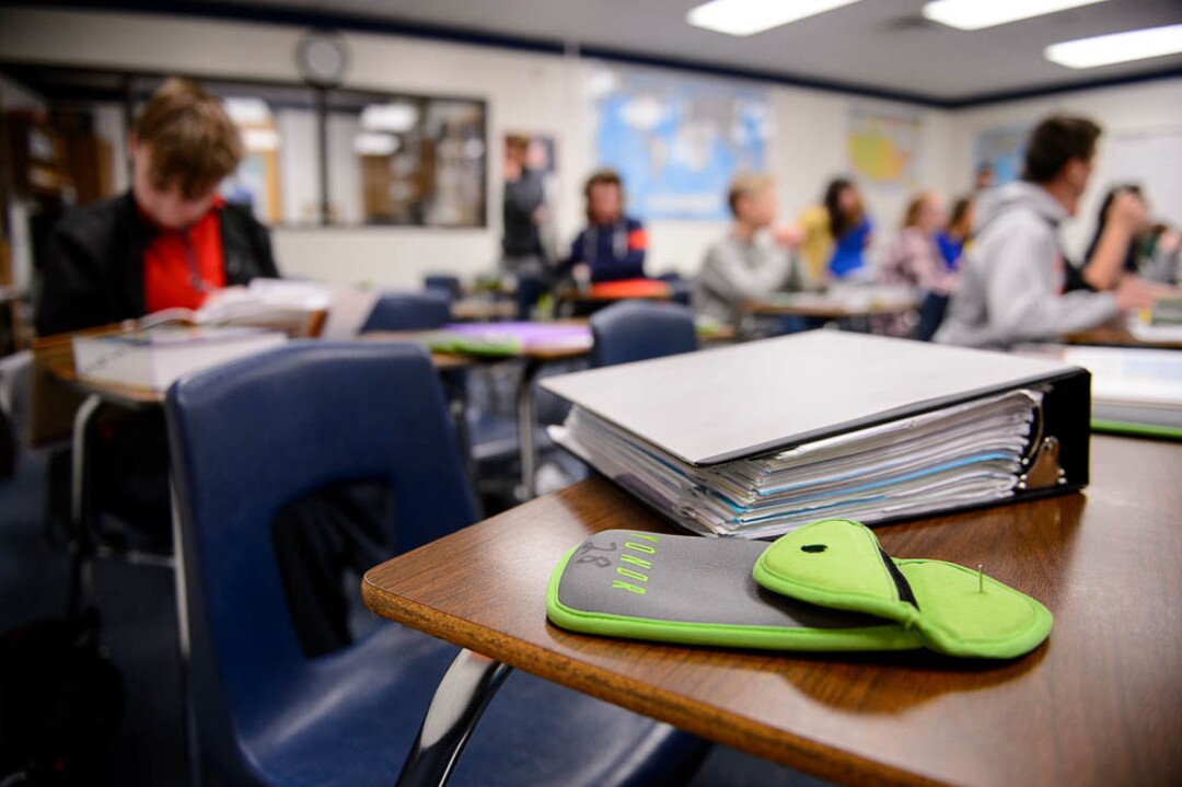 (Trent Nelson | The Salt Lake Tribune) Students in Monta Thomas' classes at Brighton High School in Cottonwood Heights secure their phones in locking pouches made by Yondr.