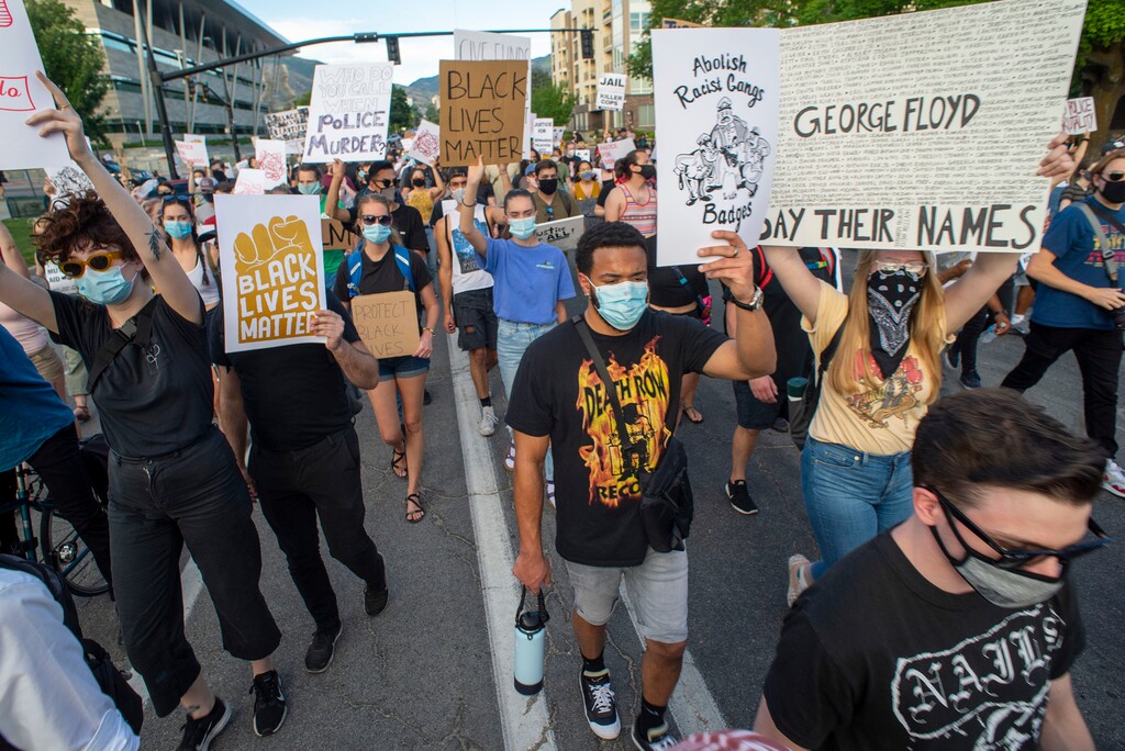 (Rick Egan  |  Tribune file photo)    Protesters as the march in the street during a Justice for Bernardo protest on Wednesday, June 24, 2020.