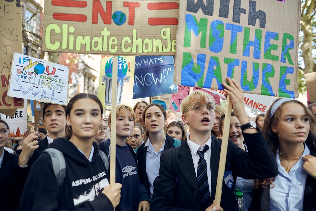 (Olivia Harris | The New York Times)
Students from Latymer Upper School gathered in protest of climate change in central London on Friday, Sept. 20, 2019. Anxious about their future on a hotter planet, angry at world leaders for failing to arrest the crisis, thousands of young people began pouring into the streets on Friday for a day of global climate protest.