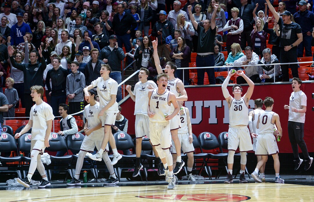 (Leah Hogsten  |  The Salt Lake Tribune) Lone Peak celebrates the win. Lone Peak defeated Pleasant Grove 61-44 to win the 6A High School BoysÕ Basketball Tournament Championship at the Jon M. Huntsman Center in Salt Lake City, Saturday, March 3, 2018. 