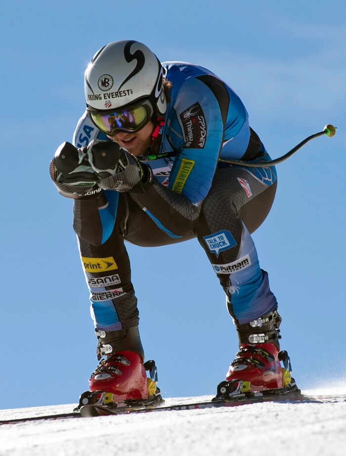 Wiley Maple, from Aspen, Colo., gets into a tuck during speed-training at the U.S. Ski Team training center at Copper Mountain, Colo., Thursday, Nov. 7, 2013. (AP Photo/Nathan Bilow)