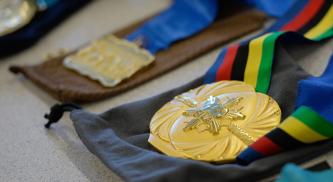 (Francisco Kjolseth  |  The Salt Lake Tribune)  Olympic wrestling champion Rulon Gardner displays his medals including his 2001 World Champion Gold as he meets with students and parents on Wed. May 16, 2018, to introduce himself as the new wrestling coach at Herriman High school. 