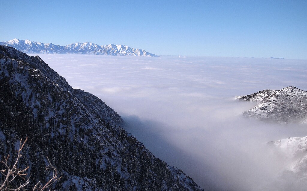Al Hartmann | The Salt Lake Tribune
Salt Lake valley trapped by a temperature inversion as seen from the overlook on Desolation Trail in Millcreek Canyon Saturday Dec. 31. There's a big city under there, somewhere. You just can't see it. Those clouds trap in pollution and lower temperatures. Oquirrh Mountains miles to the West are high enough to poke through the cloud layer and bad air.