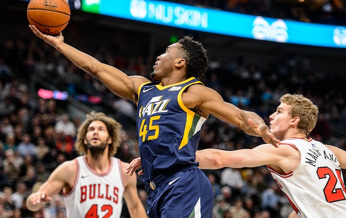 (Trent Nelson | The Salt Lake Tribune)  Utah Jazz guard Donovan Mitchell (45) shoots as the Utah Jazz host the Chicago Bulls, NBA basketball in Salt Lake City Wednesday November 22, 2017.