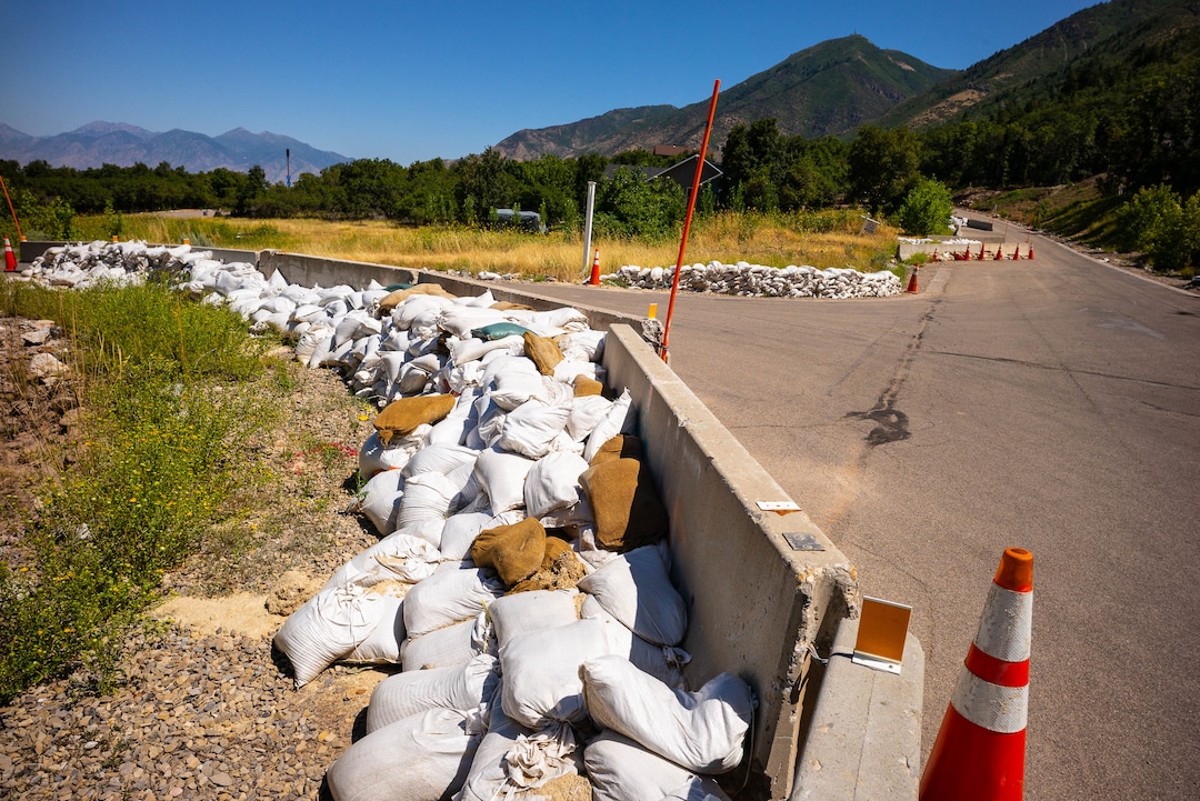 (Trent Nelson  |  The Salt Lake Tribune)  Sandbags and barriers in Woodland Hills on Thursday Aug. 15, 2019.