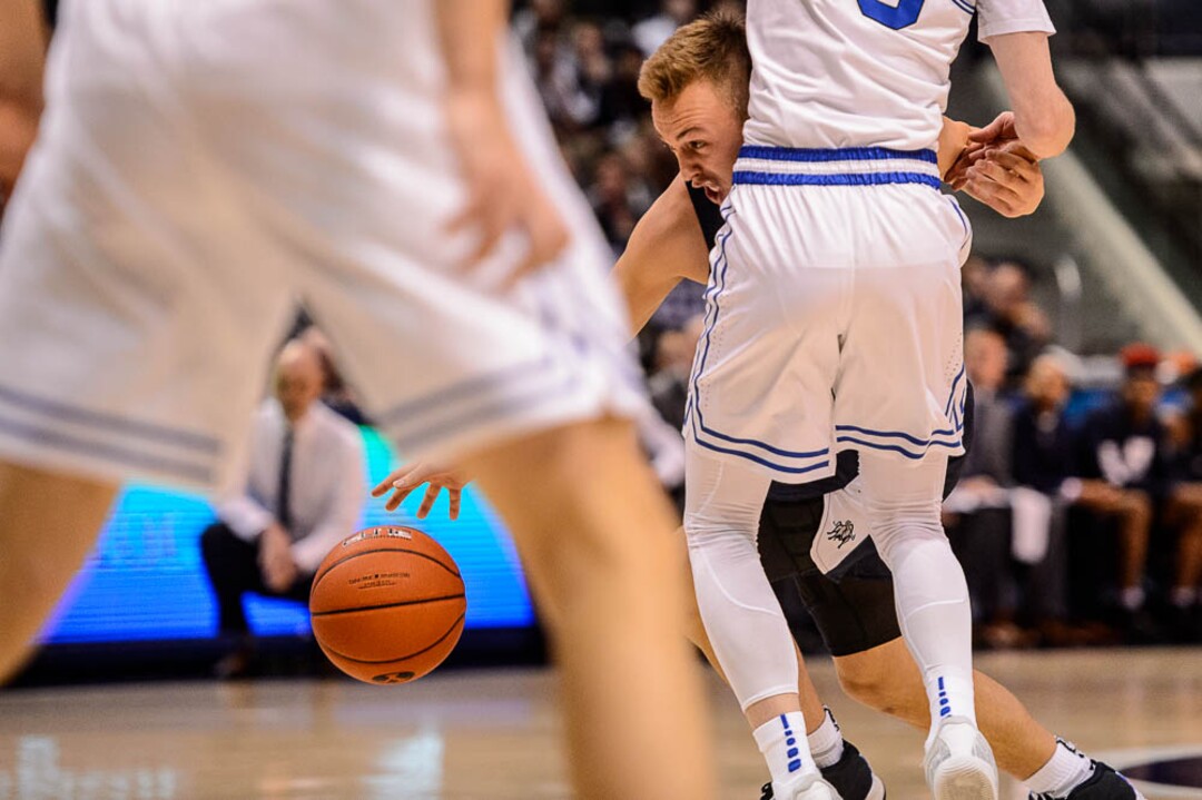 (Trent Nelson | The Salt Lake Tribune)  Utah State Aggies guard Crew Ainge (4) runs into Brigham Young Cougars guard TJ Haws (30) as BYU hosts Utah State, NCAA basketball in Provo on Wednesday Dec. 5, 2018.